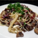Spaghetti with mushrooms and radicchio salad