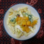 Penne in cream sauce with spinach, pumpkin and mozzarella