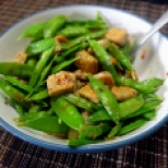 Snow peas salad with tofu and soy sauce sesame dressing