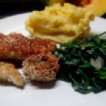 Chicken in sesame crust with mashed potatoes and baby spinach