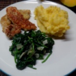 Chicken fillet and mushrooms in pesto sesame crust with mashed potatoes and baby spinach